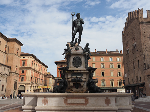 Bologna, Italy - Circa September 2022: Fontana del Nettuno translation Neptun Fountain by artists Tommaso Laureti and Giambologna circa 1563