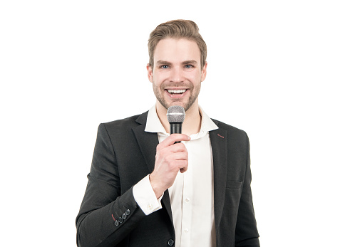 Happy man in business formalwear speak into microphone giving speech isolated on white, conferencier.