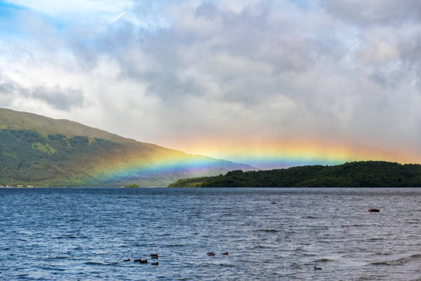 A very beautiful rainbow after the rain that appeared over the mountain