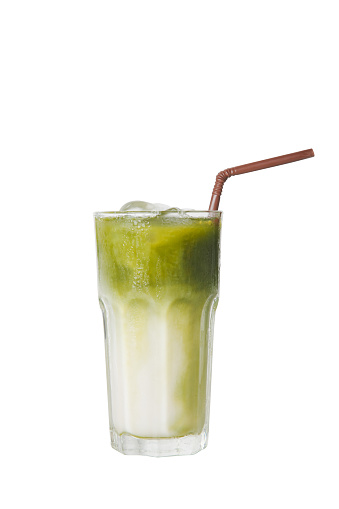 iced green tea in glass isolated white background.
