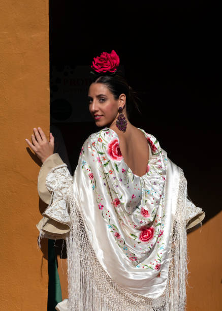Young girl wearing the typical Andalusian gypsy dress stock photo