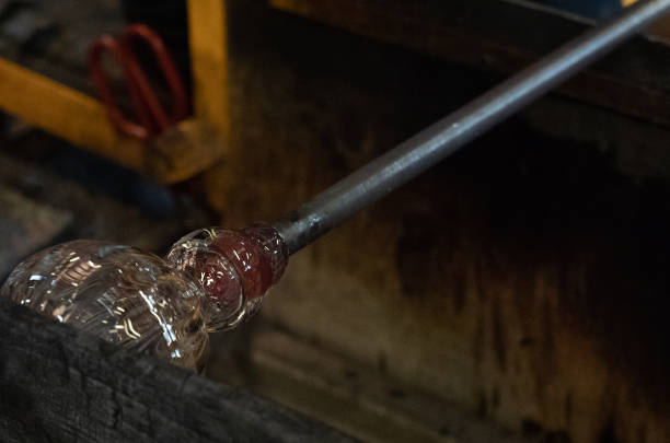 istock Glassblowing - final shaping of the glass object 1434461077