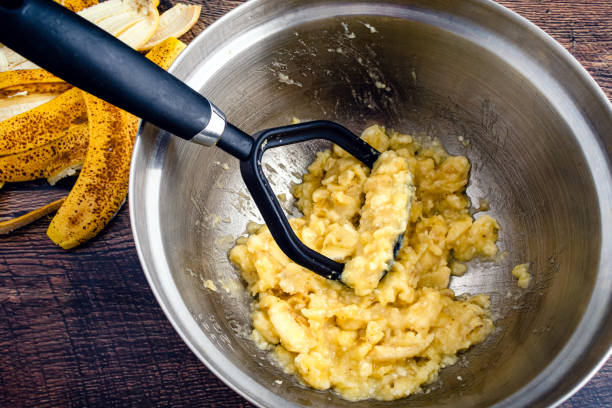 istock Mashed Banana in a Large Mixing Bowl 1434461668