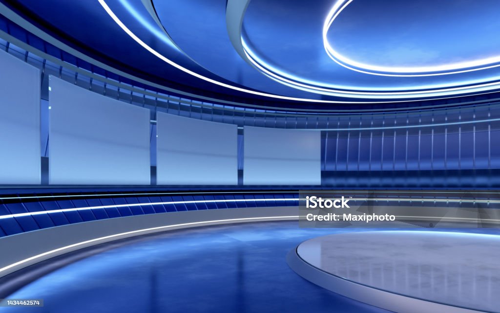Empty television studio backdrop, with circular blue walls and bright neon lights Virtual television studio with modern design, circular blue walls, reflecting surfaces, blank displays and bright illumination resembling a news broadcaster backdrop. Wide shot of empty studio with central stage illuminated by blue and white lights. Copy space. Backgrounds Stock Photo