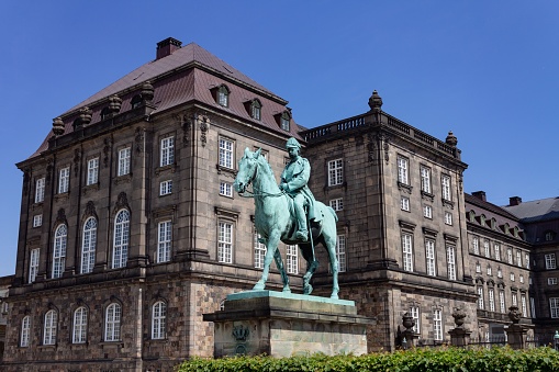 Copenhagen, Denmark – June 08, 2013: The equestrian statue of Christian IX, overlooking Christiansborg Ridebane in Copenhagen, Denmark