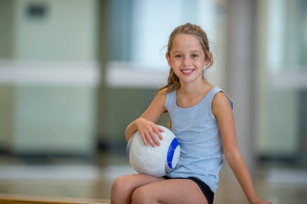 istock Young Girl with a Volleyball 1434467928