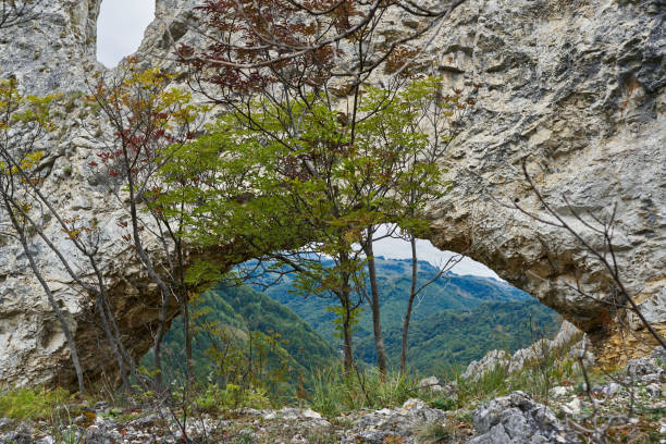 istock Natural rock portal and bridge in the mountains 1434468228