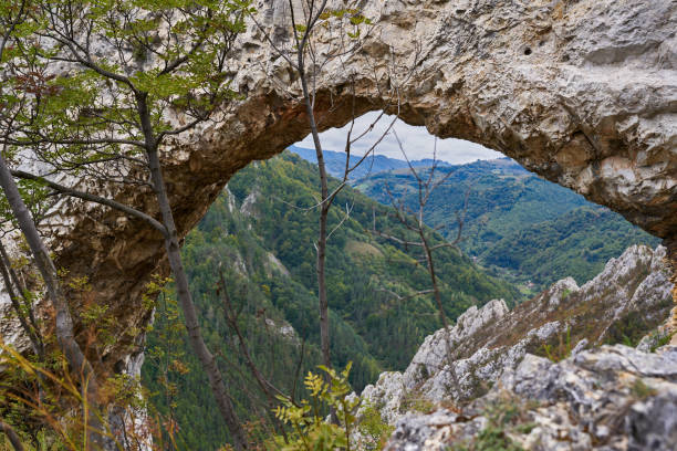 istock Natural rock portal and bridge in the mountains 1434468236
