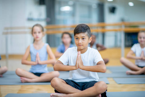 istock Children Meditating in a Gymnasium 1434471951