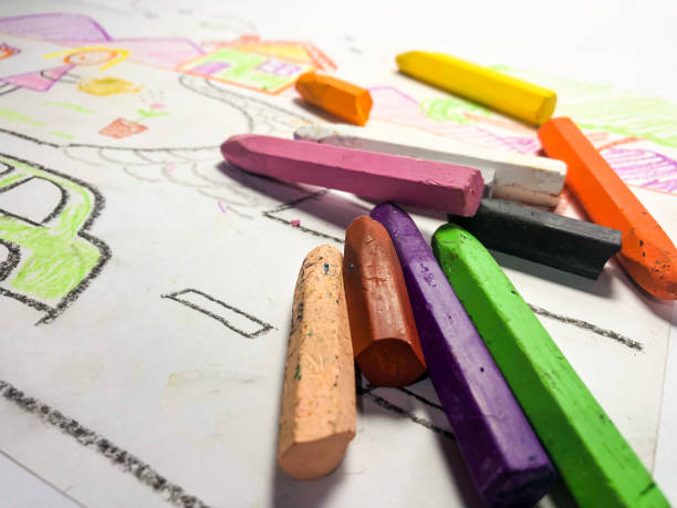 istock Close up view of Crayons set with kid's drawing 1434483134