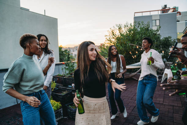 istock Friends are having fun together during a party on a rooftop 1434485802
