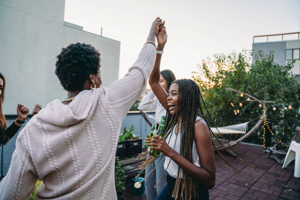 istock Friends are having fun together during a party on a rooftop 1434485825