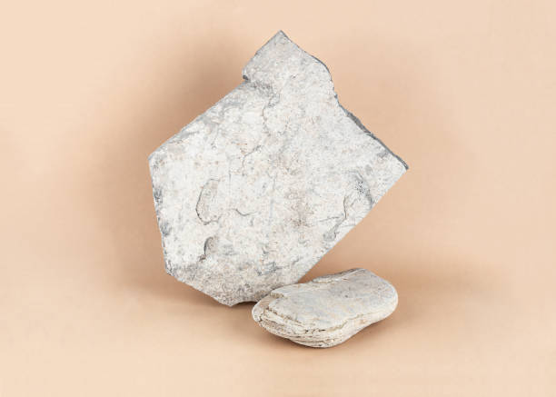 istock Stone podium for product presentation and branding on a beige background. 1434485930