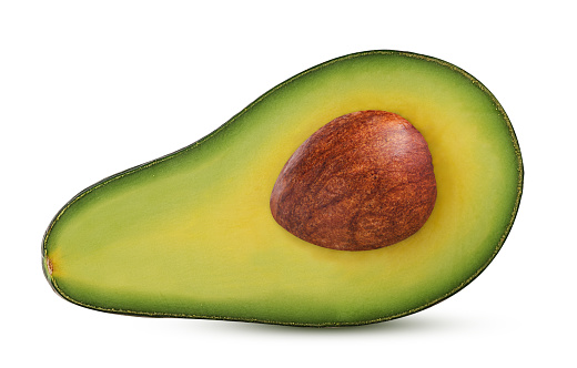 Avocado cut in half with bone isolated on white background Clipping Path