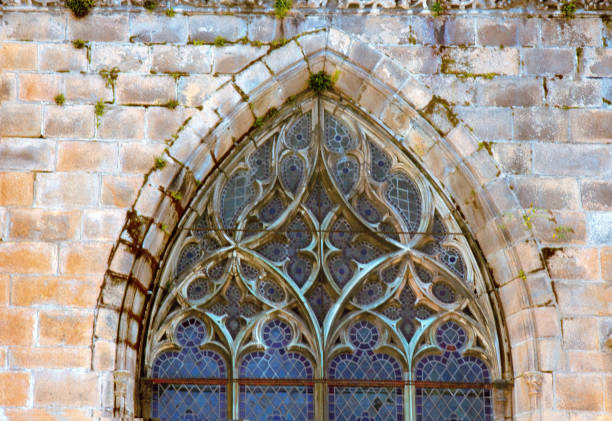 Stained glass shot of the church of Notre-Dame de l'Assomption in Château d'Oléron, built between 1700 and 1884, Romanesque style with a spire of 40 meters, at 18/135, 800 iso, f 10, 1/160 second