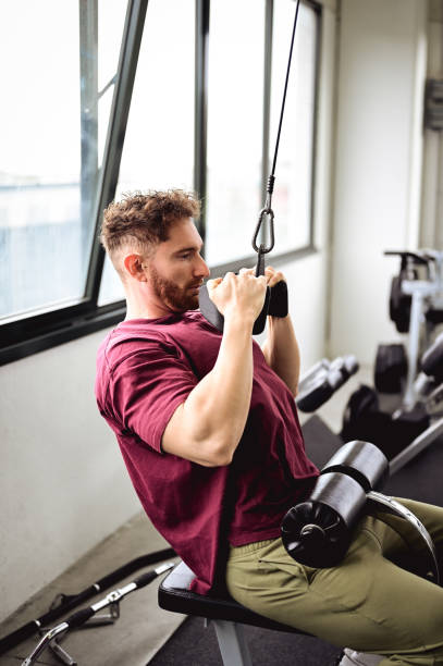 istock side view of a muscular man working out in gym doing exercises 1434489868