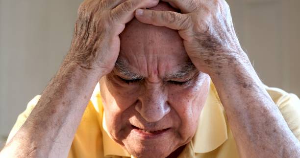 istock desperate senior hispanic man in pain looking down 1434504431