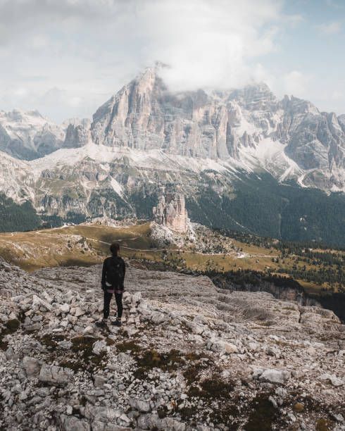 istock Hiker on mountain summit, Dolomites, Italian Alps, Italy 1434504994