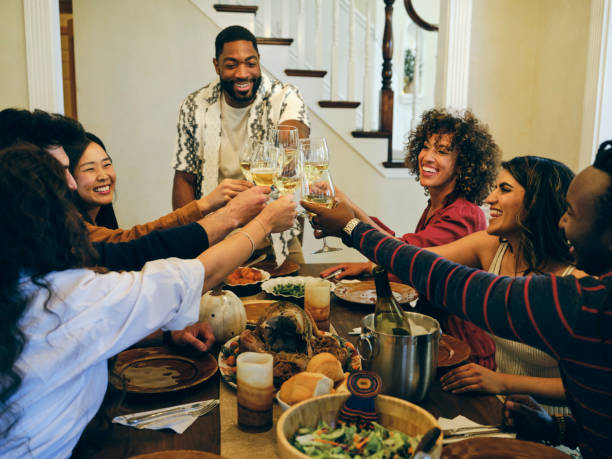 istock Group of Friends Celebrating Thanksgiving 1434511360