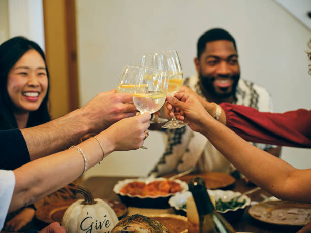 istock Group of Friends Celebrating Thanksgiving 1434511416