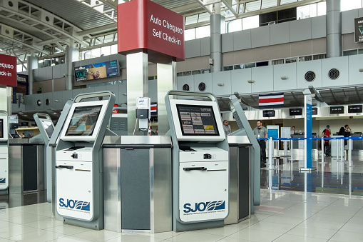 Alajuela, Costa Rica - September 22, 2022: Self-check in stations at Juan Santamaría International Airport