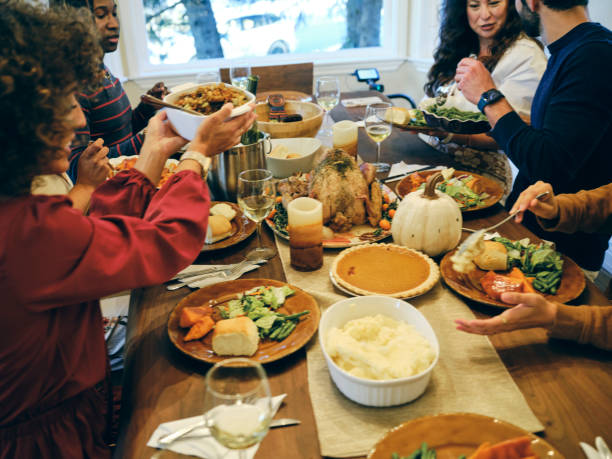istock Group of Friends Celebrating Thanksgiving 1434511728