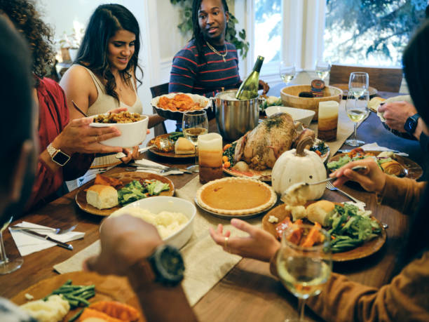 istock Group of Friends Celebrating Thanksgiving 1434511759