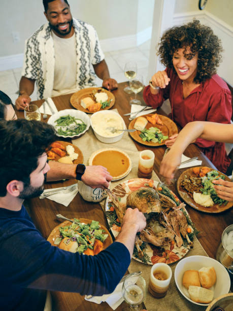 istock Group of Friends Celebrating Thanksgiving 1434511939