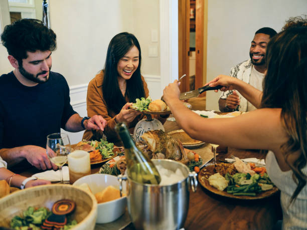 istock Group of Friends Celebrating Thanksgiving 1434512246