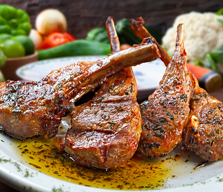 Roasted lamb chops with olive oil and herbs