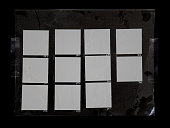 istock macro photo of black and white handcopy contactsheet with many empty film frames. 1434517410