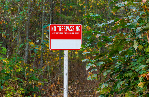 No trespassing warning sign along road Cultus Lake