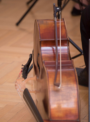 a cello or violoncello, string instrument played with a bow
