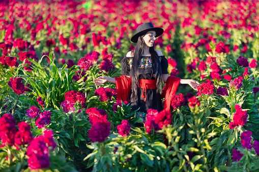 Woman smiling in Michoacan flower fields