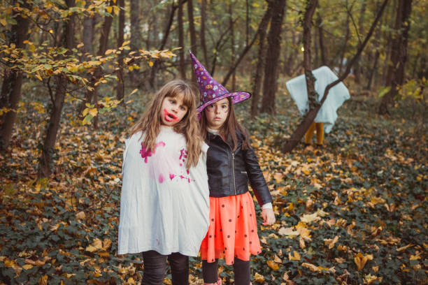 The witch, a zombie and a ghost at the woods. Note for inspection; hat is not branded by any company, random hat.
