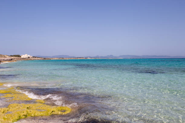 istock Rocky beach with a turquoise blue sea and waves in spain 1434529254