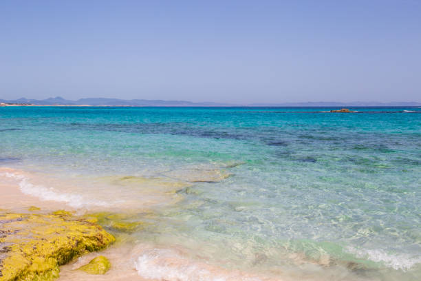 istock Rocky beach with a turquoise blue sea and waves in spain 1434529255