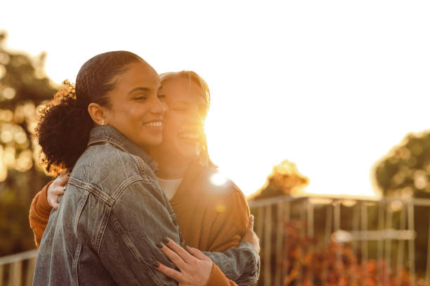 istock Best friends embracing at sunset 1434532966