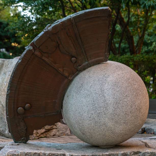 istock Closeup of granite sphere sculpture in Boston park 1434537884