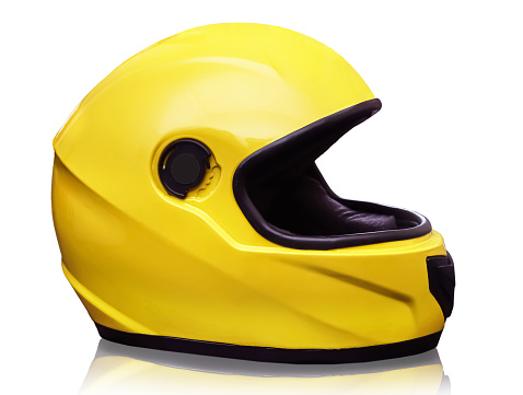 Yellow helmet for motorsport without glazing. Close-up