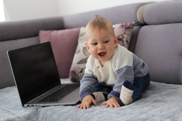 istock Playful cure baby boy. Stock photo. 1434546191