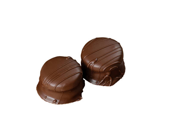 istock Two Brazilian honey cakes filled with dulce de leche (white background). 1434555570