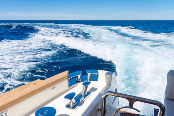 istock Look behind yacht sailing on sea surface and making waves 1434556160