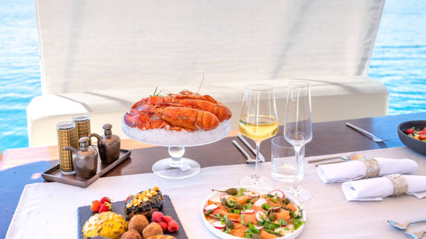 istock Delicious lobsters on ice, sliced salmon with vegetable and some sweets 1434556168