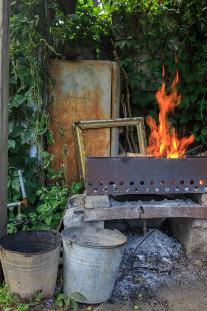 istock a fire in an old brazier in a dump of things 1434556915