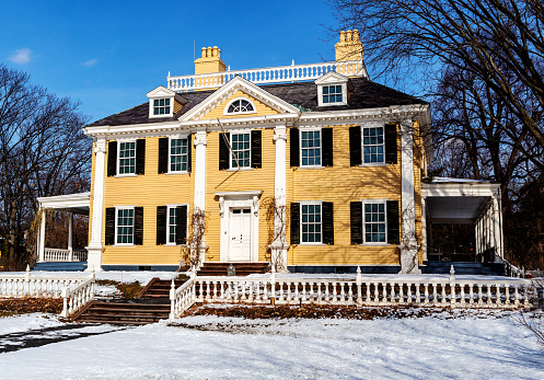 Cambridge, Massachusetts, USA - February 16, 2022: The Longfellow House (c. 1759) on Brattle Street in Cambridge. It was George Washington's headquarters between July 1775 and April 1776 during the American Revolution. The American poet Henry Wadsworth Longfellow became its owner in 1843. It is now administered by the National Park Service.