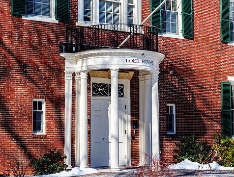 Cambridge, Massachusetts, USA - February 6, 2022: The Loeb House in Harvard University's Harvard Yard. Formerly known as the President's House, it was built in 1912 at 17 Quincy Street and named for University benefactors John L. Loeb, Sr. and Frances L. Loeb. It currently houses the University governing board offices.