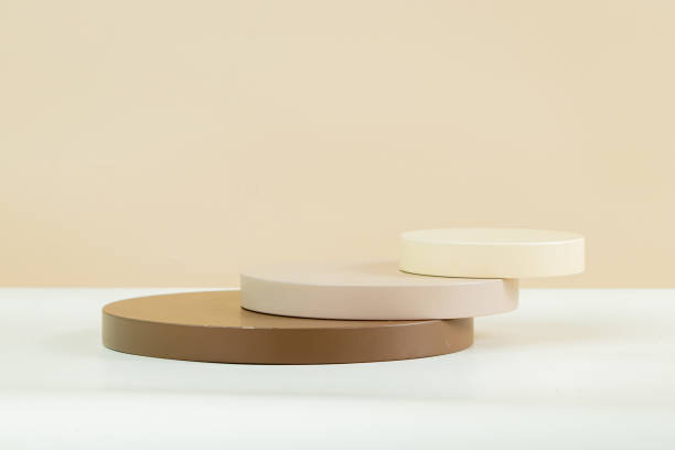istock 3d circle podium with various sizes, earth tone color with brown and white background 1434582686