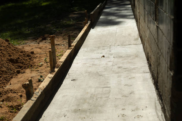 Formwork at construction site. Poured cement. Details of construction. Formwork at construction site. Poured cement. Details of construction. Poured concrete into wooden frame. concrete in formwork stock pictures, royalty-free photos & images