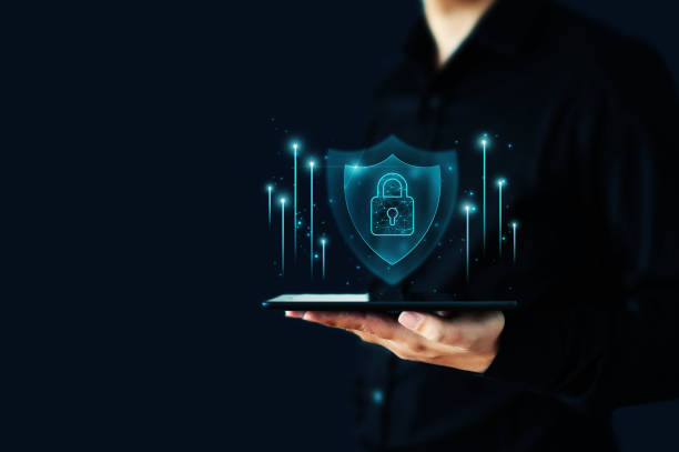 istock Protection network security computer and safe your data concept, Hand of businessman holding tablet and shield protect icon 1434588900
